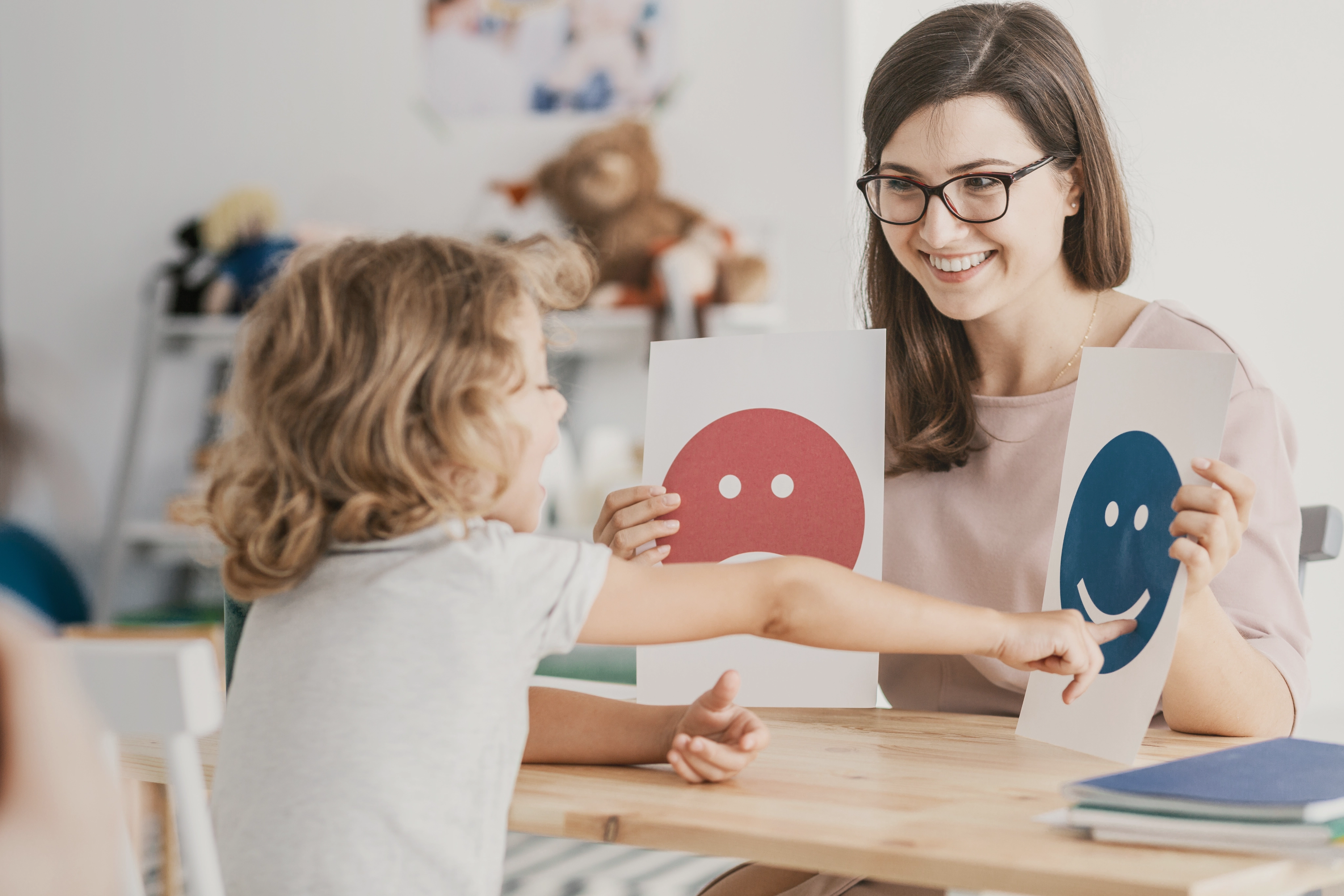 Therapist interacting with a child during an in-home ABA therapy session